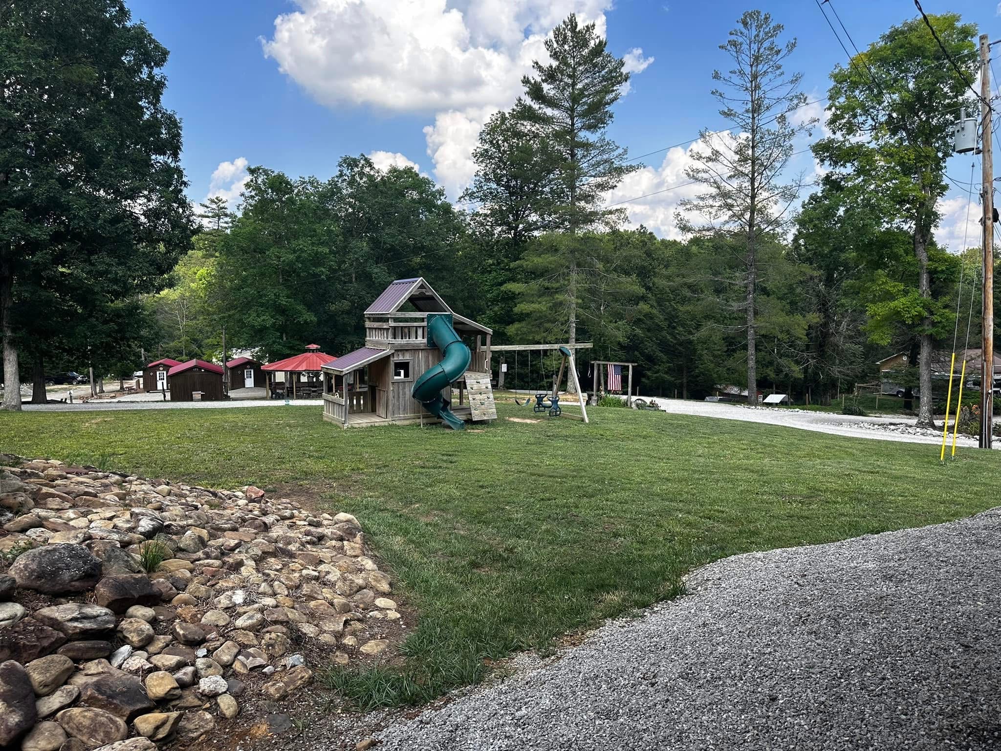 Campground lawn and playground for family reunions at Laurel Creek
